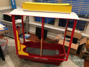 The trolley with its roof and side panels being added.